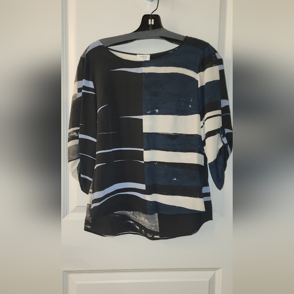 Akris Punto semi sheer blouse.